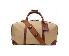 With its classically handsome looks and expandable design, the Cavalier II is your trusty partner for everything from short business trips to weekend getaways. Luxury Beige Duffle Bag With Large Capacity, Luxury Beige Duffle Bag, Luxury Beige Duffle Bag For Daily Use, Classic Tote Travel Bag For Overnight Trips, Luxury Canvas Weekender Bag With Large Capacity, Classic Large Capacity Duffle Bag For Overnight Trips, Classic Travel Tote Bag For Overnight Trips, Luxury Large Capacity Canvas Weekender Bag, Classic Tote Weekender Bag For Overnight Trips