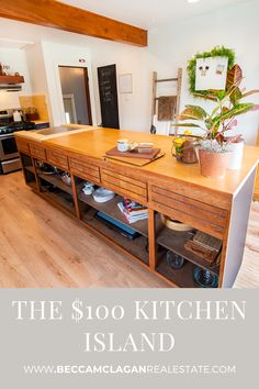 the kitchen island is made out of wood and has plants on it, with text overlay that reads the $ 100 kitchen island