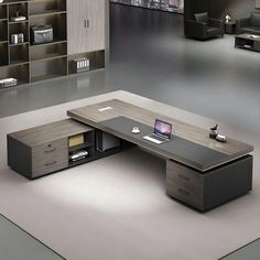 an office desk with two drawers and a laptop computer on it in the middle of a room