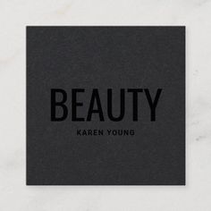 a black and white business card with the words beauty on it