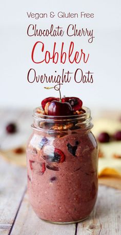 a jar filled with chocolate cherry cobbler overnight oats