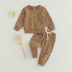 This sweet little ensemble will have your baby looking precious with its little polka dot flower print. With so much cuteness to offer, your little one will be the talk of the town! So, make sure to get it before it's gone—dots on! Polka Dot Cotton Sets For Spring, Spring Cotton Sets With Polka Dot, Spring Cotton Polka Dot Sets, Spring Cotton Sets In Polka Dot, Spring Polka Dot Cotton Sets, Cute Polka Dot Cotton Set, Cute Polka-dotted Cotton Set, Cute Polka Dot Sets For Spring, Cute Polka Dot Spring Sets