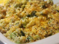 a casserole dish with broccoli and cheese