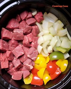 meat, peppers, and onions are in the slow cooker to make this meal