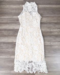 Loves Divine Midi Dress Polyester lace midi dress High neck Keyhole back Button closure on neck Beige lining Split at back This midi dress is so stunning in the white lace. With the high neck and open back, it’s classy yet sexy – the perfect party dress. Wear it with heels and a red lip – what’s not to love? SKU: L088- Dress High Neck, Red Lip, Lace Midi, Polyester Dress, Lace Midi Dress, White Midi Dress, Perfect Party, Lace Overlay, Red Lips