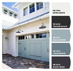 an exterior color scheme for a house with white trim and gray garage doors, which are painted in different shades