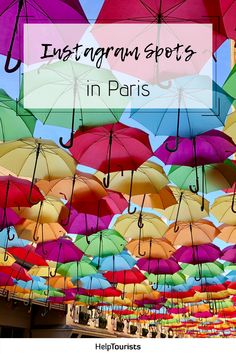 many colorful umbrellas with the words instagramn spots in paris above them and below