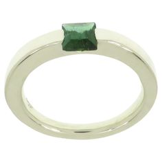 Very stylish modern band ring crafted in 9k white gold featuring at the centre a square cut natural green tourmaline. The dimension of the gemstone is 5 x 5 millimeters / 0.196 x 0.196 inches. This ring is also available with square cut gold topaz in 9 karat rose gold (1stDibs Ref: LU126214706422) and together they can be worn as stacking rings. Us finger size 6.5 / Italian size 13 / French size 53. Adjustable to the customer's size before shipping. Handmade in Italy by Botta Gioielli and marked Green Tourmaline Jewelry, Ruby Eternity Band, Green Tourmaline Ring, Gold Topaz, Tourmaline Jewelry, Eternity Band Ring, Rose Gold Band, Gold Band Ring, Ring Crafts