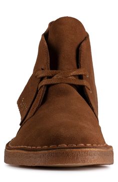 An iconic silhouette elevates a timeless boot set on a smart crepe rubber sole. Cushioned arch support Lace-up style Leather upper/textile lining/rubber sole Imported Suede Desert Boots With Leather Lining And Round Toe, Rugged Desert Boots With Rubber Sole And Round Toe, Brown High-top Desert Boots With Textured Sole, Suede Lace-up Desert Boots With Leather Lining, Lace-up Suede Desert Boots With Leather Lining, Casual Brown Boots With Suede Lining, Leather Desert Boots With Textured Sole, Brown High-top Desert Boots With Leather Sole, Classic Brown Boots With Textured Sole