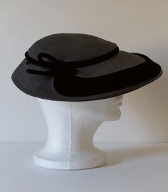 "Marshall Field And Co. Vintage Wide Brim Hat Measurements: Measurements are taken on a flat surface across one side of the item.  Length: 12\"  Width: 12\" 1/2  Height: 3\" Head opening:  length:7\" Width: 7\" 1/2 Very Good vintage condition sold AS-IS." Fitted Hat With Short Brim And Lining, Fitted Hats With Curved Brim And Lining, Fitted Lined Hats With Curved Brim, Fitted Lined Hat With Curved Brim, Vintage Fitted Felt Hat For Summer, Vintage Gray Hat, One Size, Vintage Gray Brimmed Hat, Vintage Gray Hat, One Size Fits Most, Vintage Black Adjustable Sun Hat