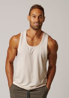 Designed + Manufactured in Los Angeles Define cut minimalist design tank top Approx. 10 plastic bottles recycled in each shirt Fabric blended with Lyocell, an ultra-soft and naturally cooling, sustainable fiber 73 Recycled Poly, 18 Lyocell, 9 Spandex Models are 6'0 and 5'10" all wearing Size 2 Everyday Activewear In Recycled Polyester, Everyday Solid Activewear In Recycled Polyester, Go-dry Sleeveless Top In Recycled Polyester, Sleeveless Go-dry Top In Recycled Polyester, Functional Seamless Tank Top For Summer, Functional White Everyday Activewear, Compressive Athleisure Tank Top For Everyday, Sleeveless Athleisure Top In Recycled Polyester, Sporty Sleeveless Top In Recycled Polyester