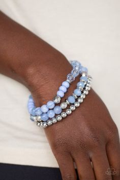 Infused with shimmery silver accents, a collection of glassy, acrylic, and crystal-like blue beads are threaded along stretchy bands around the wrist, creating colorful layers. Sold as one set of three bracelets. Rose Gold Beads, Silver Frames, Paparazzi Accessories, Blue Gems, Stretchy Bracelets, Paparazzi Jewelry, Blue Bracelet, One Set, Blue Earrings