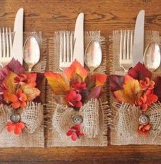 the forks are decorated with fall leaves and burlap