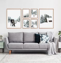 a living room filled with furniture and pictures on the wall above it's couch