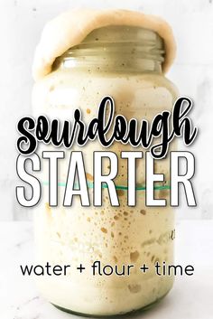 a jar filled with liquid and the words sourdough starter water + flour time