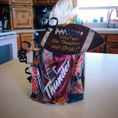 a canister filled with candy sitting on top of a kitchen counter