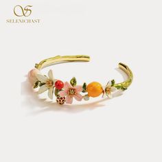 Plating: 18K Gold Materials: 18K Gold on Brass, Enamel, Silver Weight: 426g/pr 18k Gold Bangle, Flower Cuff, Cherry Flower, Dazzling Earrings, Fruit Jewelry, Enamel Bracelet, Jewelry Lookbook, Nature Inspired Jewelry, Gold Bangle Bracelet