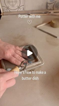 a woman is using a butter dish to make something with her fingers and thumbnails