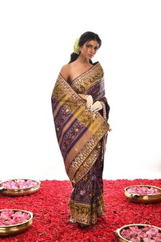 Indulge in the delicate beauty of this Authentic Pure silk Patan Patola Gota Patti Saree. Hand-embroidered in eye-catching Purple, it perfectly captures heritage elegance with a modern flair. Luxuriously soft and radiant, it is sure to make a statement at any event. Elegant Art Silk Pre-draped Saree For Traditional Ceremonies, Elegant Multicolor Pre-draped Saree With Zari Weaving, Pre-draped Tissue Silk Saree With Cutdana For Traditional Ceremonies, Traditional Silk Pre-draped Saree With Intricate Embroidery, Traditional Pre-draped Tissue Silk Saree, Luxury Festive Lehenga With Resham Embroidery, Silk Pre-draped Saree With Intricate Embroidery For Transitional Season, Festive Tussar Silk Pre-draped Saree With Intricate Embroidery, Silk Pre-draped Saree With Cutdana For Traditional Ceremonies