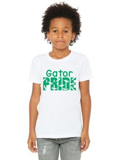 "This \"Gator Pride\" t-shirt has been designed especially for your Goodrich Gator! *Youth sizing *Three different shirt colors available *We press on Bella+Canvas jersey t-shirts. *They're very soft & preshrunk *Each shirt is made to order All items will be delivered to the school and sent home with your child.  If this is a gift, please send me a message and we can get your items to you a different way! A portion of ALL sales will be donated back directly to the Goodrich PTO!  Thank you for supporting your school!" Green Letter Print T-shirt For Fan Gear, Green T-shirt With Letter Print For Fans, Green Sublimation Print T-shirt For Fan Merchandise, Green T-shirt With Sublimation Print For Fans, Green T-shirt With Team Name For Fans, Casual Green Sublimation T-shirt With Team Name, Casual Tops With Team Name For Fan Events, Casual Team Name Tops For Fan Events, Green T-shirt For Team Spirit Fan Merchandise