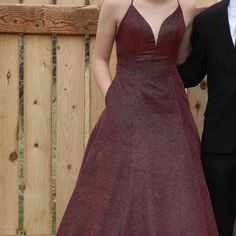 Great Condition. Size 6 Dress By Tiffany. The Color Is Burgandy -Wine Its Simmery - (Zoom In On Photos) It Has Pockets On Both Sides And Lace Up In Back. Only Worn Once. Person In Picture Wearing Dress Is 5'9" There Is A Slight Piece Of Skin Tone Mess In Front So It Is Not Open As Far Dwon As It Appears (Se Photos) That Can Be Stiched Up To Close More If Needed. Size 6 Dress, Homecoming Dress, Dress With Pockets, Wearing Dress, Tiffany & Co., Skin Tone, Homecoming Dresses, Homecoming, Prom