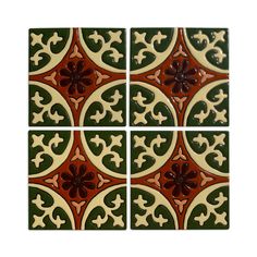 four green and brown tiles with flowers on them