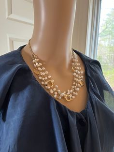 Excellent condition. Max. length: 21.5in.; min. length: 18.5in. Gold Multi-strand Pearl Necklace, Elegant Layered Long Necklace, Elegant Layered Multi-strand Chain Necklace, Elegant Multi-strand Pearl Chain Necklace, Elegant Multi-strand Layered Chain Necklace, Elegant Beaded Metal Layered Necklace, Chic Multi-strand Layered Necklace, Elegant Multi-strand Bib Necklace For Party, Chic Multi-strand Necklace For Formal Occasions