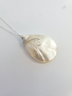 These beautiful necklaces are made from real Mother of Pearl shell on the sterling silver chain. Beautiful as a Bride's Jewelry or as a Bridesmaid's Gift. The perfect choice for a unique dainty gift to your mother, daughter, best friend or just because you deserve it. Each item is carefully packaged in an elegant jewelry box. If you would like to add a personalized note with your order, just write a note at checkout and I will send a small card with your gift to the recipient. If you need a bigg White Shell Necklace With Pearl Pendant As Gift, Pearl White Jewelry With Lobster Clasp For Gift, White Sterling Silver Shell Necklace For Gift, White Sterling Silver Shell Necklace As Gift, White Shell-shaped Jewelry With Pearl Pendant, Pearl White Teardrop Pendant Pearl Necklace As Gift, Pearl White Teardrop Pendant Necklace As Gift, Pearl Shell Necklace With Lobster Clasp As Gift, Gift Teardrop Pearl White Necklace