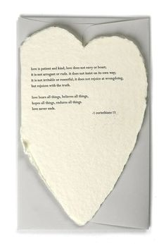 a piece of paper with a poem written on it in the shape of a heart