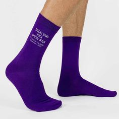 a man wearing purple socks with the words your design printed here