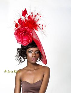 From my spring collection here is this gorgeous Red hat, made of Sinamay, forming a disk shape, seated on a velvet headband, Embellished with a large hand made silk satin rose, and assorted feathers.. NOTE: The original rose as pictured is not longer available, I'm using a similar silk rose, see last photo. All my hats are hand made in the US, made to order, please allow 2 weeks, if this is a rush order please contact me first. All sales are final. thank you Arturo :) Sinamay Hat, Dressy Hats, Pink Hats, Kentucky Derby Fascinator, Derby Outfits, Derby Fascinator, Sinamay Hats, Couture Hats, Melbourne Cup