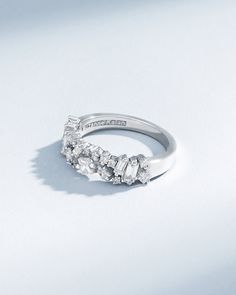 Embrace timeless romance and modern artistry with the La Fantaisie Half Band. This exquisite piece is a symphony of light, featuring an array of baguette and princess-cut white diamonds, each chosen for their radiance and clarity. Details 18k yellow gold, rose gold or white gold 0.97 carats of baguette, princess and round white diamonds 5.5mm width Ref: BAR1054D Luxury Rose Cut Diamonds For Anniversary, Luxury Rose Cut Diamond Anniversary Ring, Elegant Rose Cut Diamonds For Wedding And Anniversary, Elegant Rose Cut Diamond Wedding And Anniversary Rings, Elegant Rose Cut Diamond Anniversary Jewelry, Timeless Rose Cut Diamond Wedding Jewelry, Elegant Wedding Single Cut Diamonds Jewelry, Elegant Diamond White Wedding Ring With Diamond Cut, Luxury Moissanite Wedding Ring With Diamond Cut