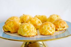 some biscuits are on a blue and gold plate