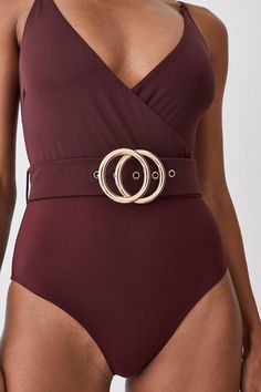 This Form-Skimming Swimsuit Makes An Elegant Choice For Warm Weather Getaways. Featuring A Plunging V-Neckline And A Gold-Tone Double Belt Design, This One Piece Promises To Exude Glamour From Pool To Beach. Style This Piece With Wide-Leg Trousers For An Understated Beach-To-Bar Look.Style: Swimsuitdesign: Plainfabric: Swimneckline: Strappy Belted Swimsuit, Swimsuit Brown, Double Belt, Swimsuit Collection, Swimsuit Design, Belt Design, Karen Millen, Fashion Face, Beach Style