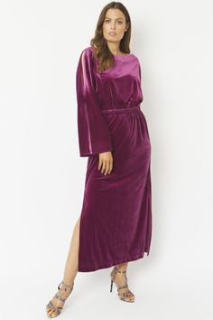 A dramatic and elegant full length maxi dress in luxurious stretch velvet. A true show stopper which will fill you with confidence when you step into it. Featuring an elasticated waistline and cold shoulders.  Velvet dress   One size   Comfortably fits sizes 10-14 Colour Violet, Faux Fur Accessories, Fur Accessories, Full Length Gowns, Womenswear Fashion, Stretch Velvet, Purple Velvet, Fur Fashion, Dress First