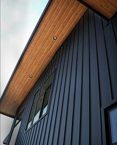 the side of a building with a wooden roof