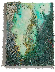 an abstract painting with green and gold colors on it's surface, including bubbles