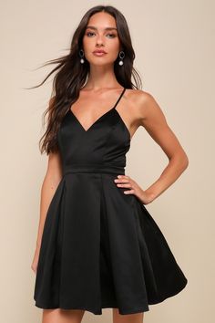 Everyone will want to be your plus one when they see you in the Lulus Be With You Black Skater Dress! This party-perfect dress kicks things off with a sleek satin-y woven fabric construction, a princess-seamed triangle bodice, and adjustable crisscrossing straps. A high, banded waist tops off a pleated skater skirt with the perfect amount of flare thanks to a hidden layer of tulle underneath. Hidden side pockets are perfect for stashing a clutch bag while you're on the dance floor. Hidden back z Skater Dress Homecoming, Hoco 2024, Black Skater Dress, Fabric Construction, Black Dress Formal, On The Dance Floor, Cup Sizes, Hoco Dresses, Princess Seam