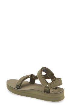 A soft canvas upper with frayed edges brings boho charm to a sporty ankle-strap sandal lifted by a modest platform with a sturdy, adventure-ready sole. 1 1/4" heel; 3/4" platform (size 8.5) Cushioned EVA footbed with arch support Textile and leather upper and lining/rubber sole Imported Casual Adjustable Sandals, Casual Canvas Sandals With Cushioned Footbed, Comfortable Platform Sandals For Outdoor, Spring Outdoor Platform Sport Sandals, Casual Outdoor Platform Sandals, Casual Open Toe Canvas Sandals, Casual Canvas Open Toe Sandals, Summer Adventure Sport Sandals With Open Toe, Comfortable Canvas Sandals For Summer