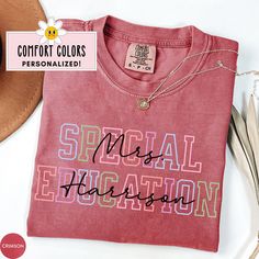 a t - shirt with the words special education on it next to a hat and utensils