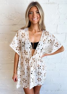 Elevate your beach look with this ivory front tie bathing suit cover up, offering effortless style and versatile comfort for poolside lounging or seaside strolls. 100% Cotton Hand Wash Cold Line Dry Front Tie Meet Brae! Height: 5’7” Hips: 35” Bust:34” Waist: 25” Wearing Size: Small Bathing Suit Cover, Denim Sweater, Bathing Suit Covers, Sweater Crop, Bathing Suit Cover Up, Vintage Havana, Sweater Gift, Crop Top Sweater, Romper Dress