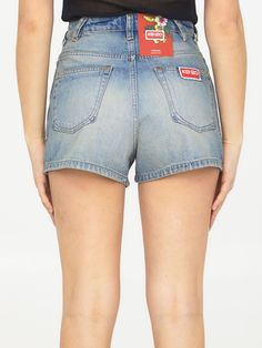 High-waisted shorts in washed-out light-blue denim with visible stitching. It features zip and button closure, five-pocket design and belt loops. Kenzo label at the back. The model is 180cm tall and wears size 26. Size nationality: US Product number: 37292697 Product code: FD52DS2246B3DY Composition: 100% cotton Medium Wash Rigid Denim Shorts, Light Wash Shorts With Five Pockets, Light Wash Denim Shorts With Belt Loops, Denim Blue Rigid Denim Shorts, Blue Jean Shorts With Belt Loops, Denim Jean Shorts With Belt Loops, Short Jeans With Belt Loops, Washed Blue Jean Shorts, Washed Blue Shorts With Five Pockets