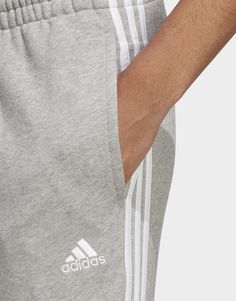 Throw these adidas pants on to warm up before your workout, and then feel free to wear them for the rest of the day. The slim fit adds a sporty look, while the drawcord on the elastic waist adds security. They are made from all cotton French terry to keep you comfy no matter what your day has in store.• Slim fit• Drawcord on elastic waist• 100% cotton• Side pockets• Ribbed cuffs• Made with Better Cotton Adidas Pants, Grey Adidas, Jd Sports, Sporty Look, French Terry, Elastic Waist, The Day, In Store, Matter