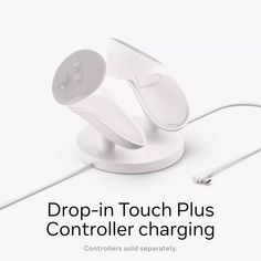 an image of a white device with the text drop - in touch plus controller charging