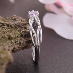 "Celtic style 925 sterling silver womens amethyst promise ring, Unique dainty & elegant promise ring for her, Celtic amethyst engagement ring WE OFFER UNLIMITED PERIOD INSTALLMENTS PLAN This is a beautiful, stunning, feminine ring that works well for all occasions, styles, and ages. You will love it! Ring information Stone: Amethyst Approximate size: 3.5mm Metal type: Silver Metal stamp: 925 Sterling SIlver Customization / Replacements It's easy to create jewelry that's perfect for you. Chan Dainty Purple Promise Ring Jewelry, Sterling Silver Solitaire Rings For Promise, Sterling Silver Amethyst Ring With Prong Setting For Promise, Purple Sterling Silver Promise Ring, Promise Amethyst Ring With Prong Setting In Silver, Silver Adjustable Amethyst Promise Ring, Adjustable Silver Amethyst Promise Ring, Silver Amethyst Birthstone Ring In Dainty Style, Purple Sterling Silver Crystal Promise Ring