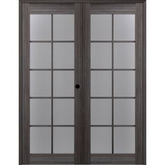 a double door with glass panels on the outside and inside doors, both side by side