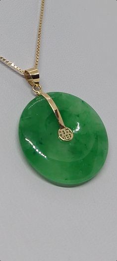 "14K Yellow Gold Color, Translucent Green Jade Donut Luck \"Fu\" Pendant with 18 Inches Chain. Beautiful vintage 14k solid gold green jade donut pendant. Jade stone measures 22mm x 22mm with Good Fortune Chinese character in the center for great jade lover. -Product Info: - Donut Luck Stone: Green Jade / Lavender - Donut Luck Measures: 22mm x 22mm Green Jade. - Metal: 14k Solid Gold. - Chain Length: 18 Inches. - Nice Gift Box Included." Crystal Jewelry Diy, Donut Pendant, Yellow Gold Color, Classy Jewelry, Disc Pendant, Jade Stone, Jade Pendant, Green Jade, Jade Green