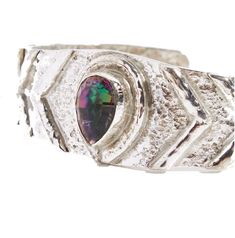 Inspired by ancient Egyptian fashion, this one of our most popular pieces due to the sacred design and uniqueness held in this powerful bangle. Mystic topaz is the main focal point of this bangle, used to connect to your spiritual self and align with the energies of the universe. All of The World Of INDAH gems are designed by Coco Effendi, handcrafted in Indonesia by our talented team of artisans using traditional techniques & tools from recycled brass. Each item is carefully dipped in 24k gold Spiritual Bangle With Intricate Design, Handmade Spiritual Turquoise Bangle, Spiritual Gemstone Cuff Bangle Bracelet, Carved Spiritual Bangle, Ancient Egyptian Fashion, Spiritual Agate Bangle, Aura Necklace, Egyptian Fashion, Beautiful Energy