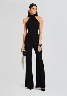 Define your style with Sans Faff's Taylor Tie Back Jumpsuit- a fusion of allure and sophistication that's designed to flatter and captivate. This jumpsuit, featuring an open back and a flared bottom, is a statement piece for those who appreciate modern elegance and a touch of drama. Shown here in Black. 71% Acetate 29% Formal Ceremony Outfit, Jumpsuit Dress Formal, How To Style Black Jumpsuit, Elegant Jumpsuits For Women, Elegant New Years Outfit, Two Piece Formal Outfit, Thesis Outfit, Jumpsuit Outfit Elegant, One Piece Jumpsuit Outfits