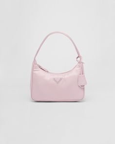 Zipper closure Enameled metal triangle logo Woven tape handle Logo-print Re-Nylon lining Pink Prada Bag, Life Necessities, Saffiano Leather Mini Bag, Prada Mini Bag, Prada Re Edition 2000, Prada Mini, Prada Purses, Leather Mini Bag, Prada Re Edition